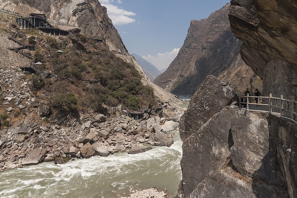 Steep rock walls and river at Tiger Leaping Gorge in Yunnan